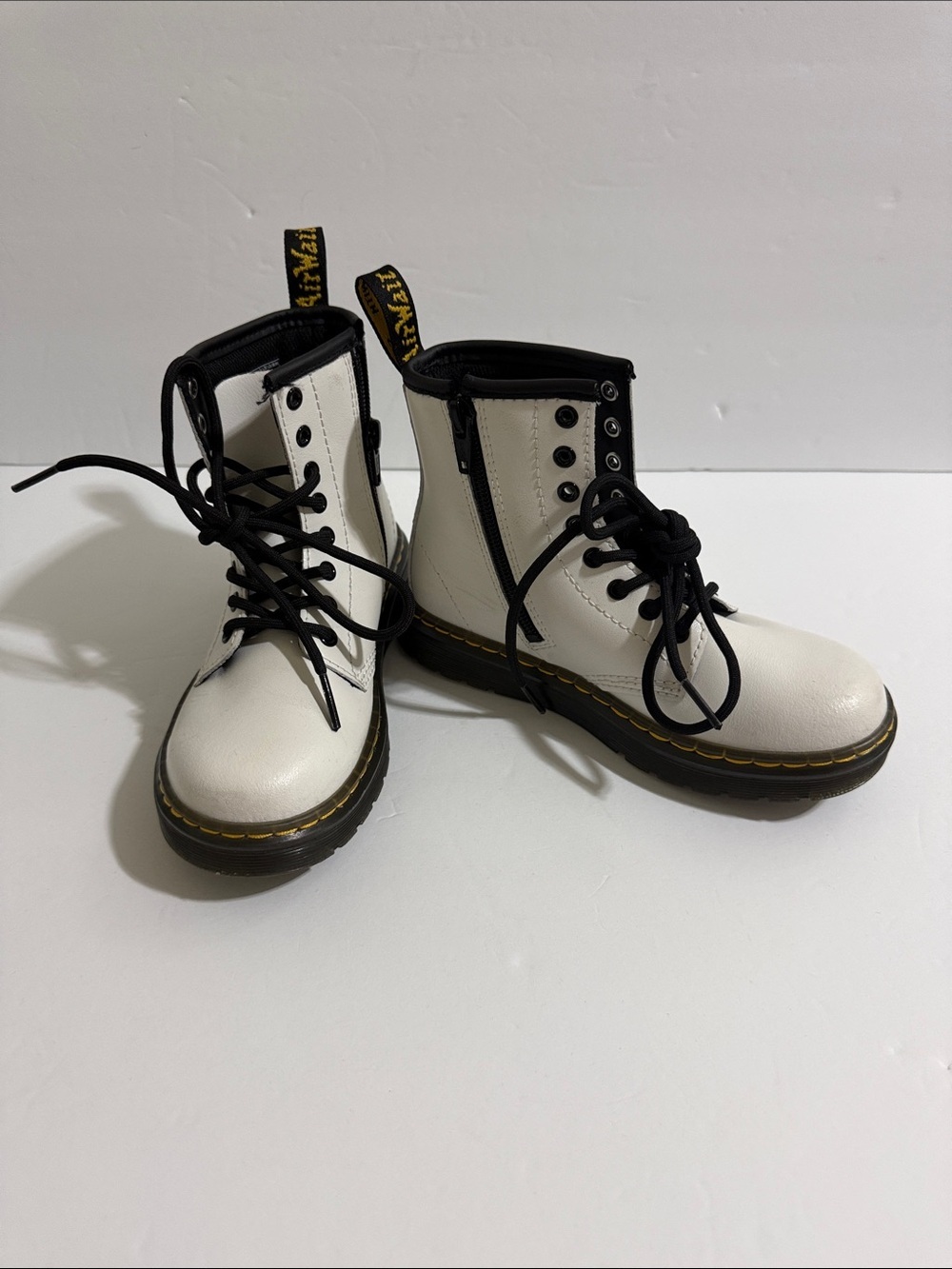 Dr. Martens Kids White Leather Ankle Boots with Black Accents
